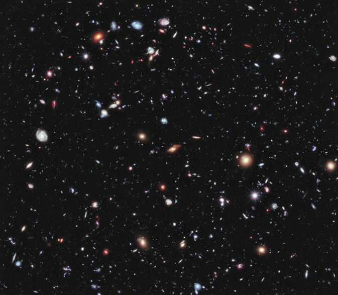 An image of the Ultra Deep Field, an image taken by Hubble that depicts hundreds of galaxies.